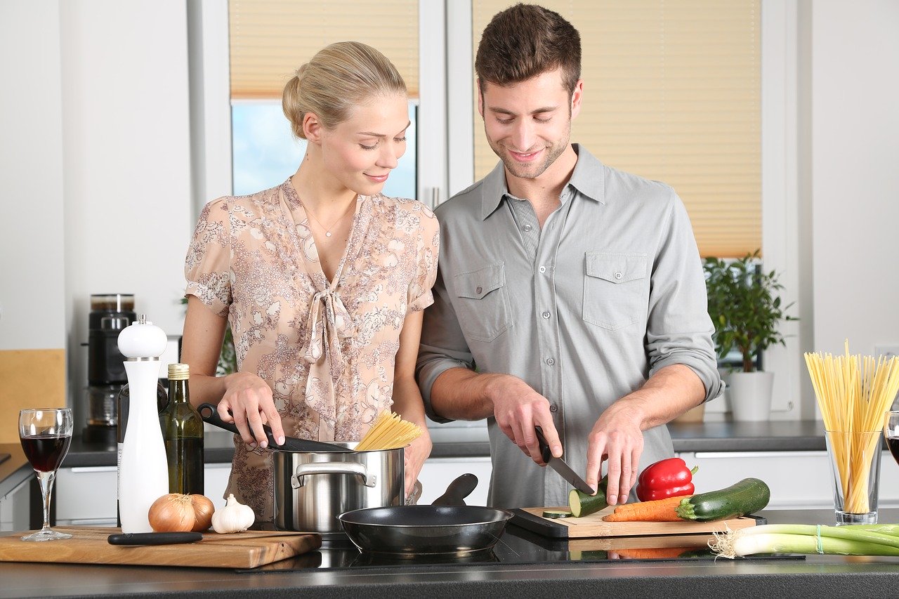 man & woman in kitchen